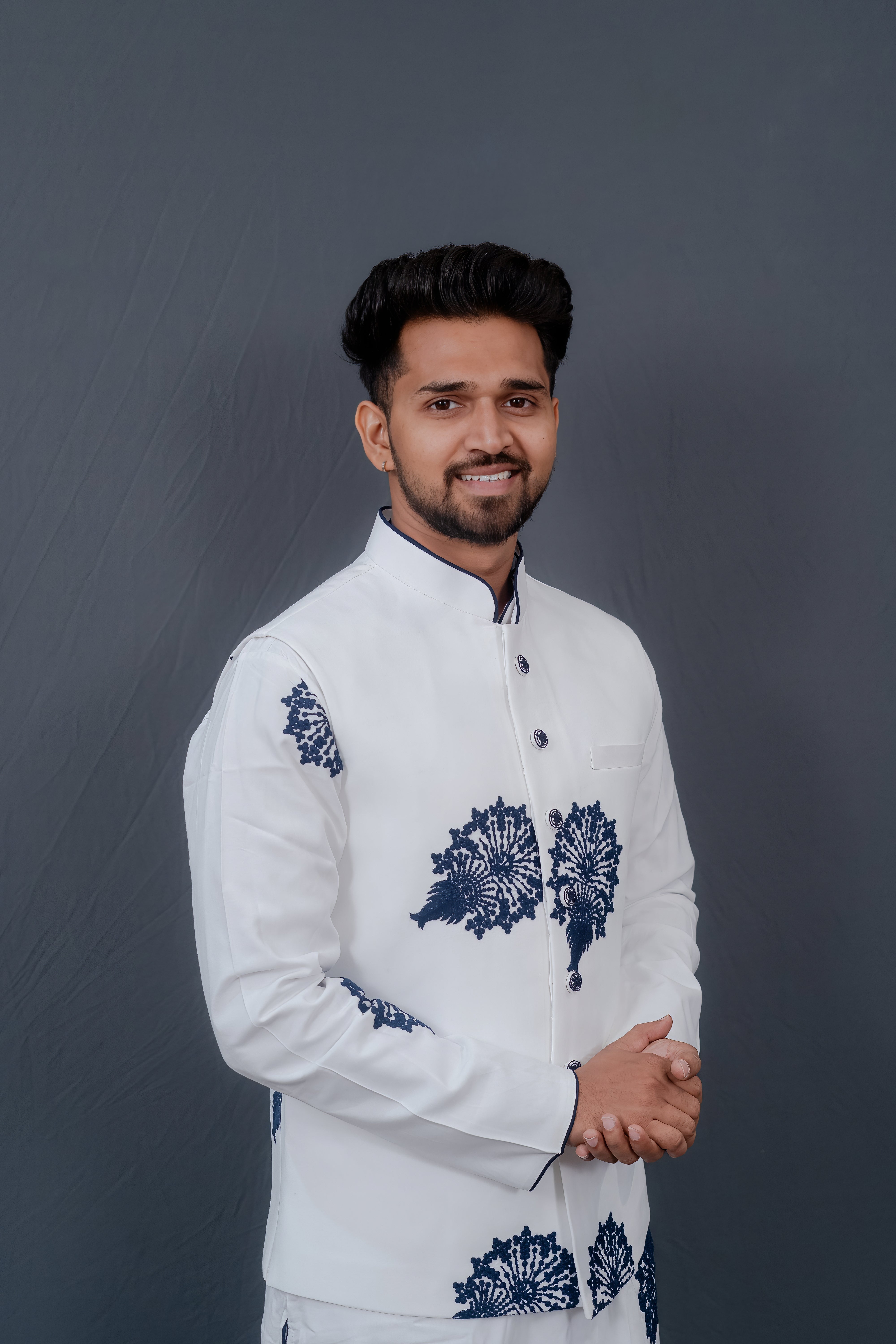 Men's White Kurta Set with Embroidered Jacket and Navy Blue Leaf Detailing