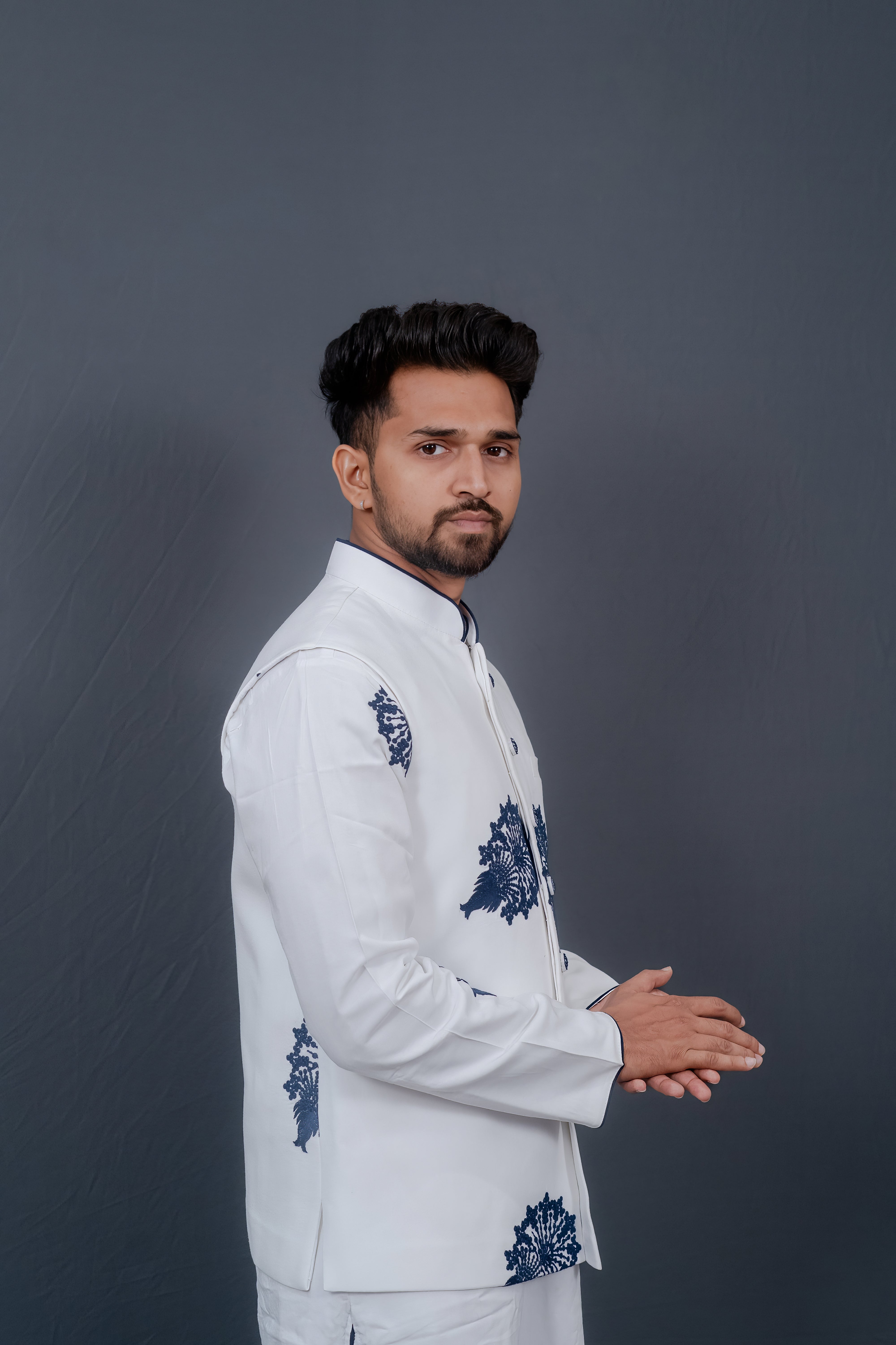 Men's White Kurta Set with Embroidered Jacket and Navy Blue Leaf Detailing